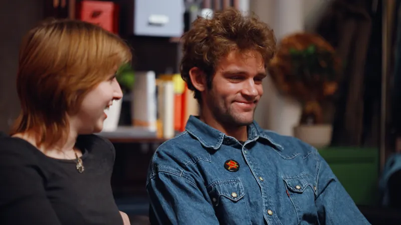 A young couple laughing together on AL: The Show