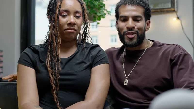 A couple listening to AL during an episode